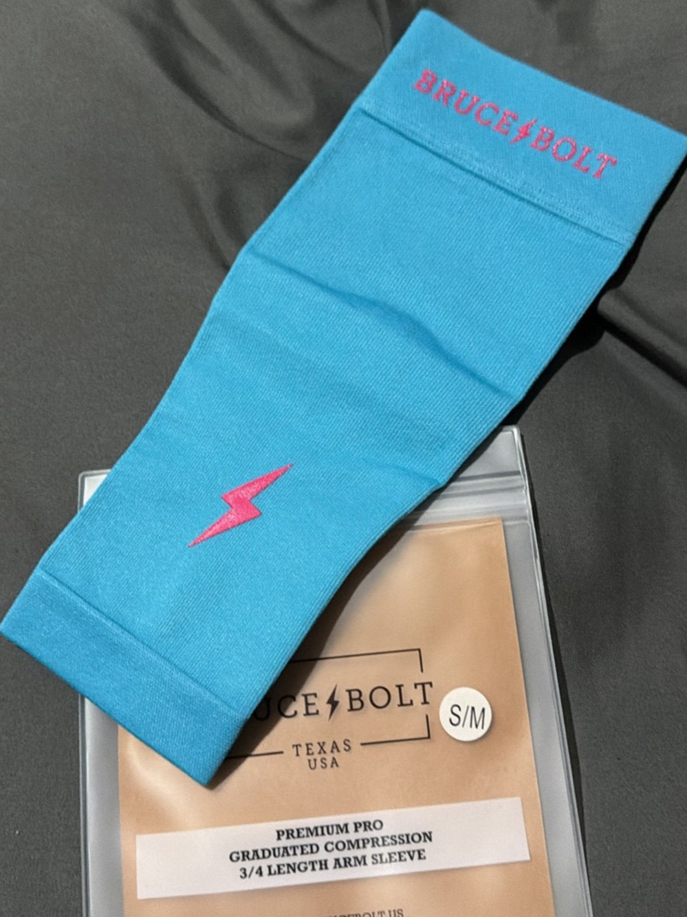 Bruce + Bolt Kids Compression Arm Sleeve - Teal with Pink Accent